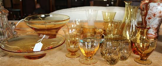 Collection of decorative amber-coloured glassware
